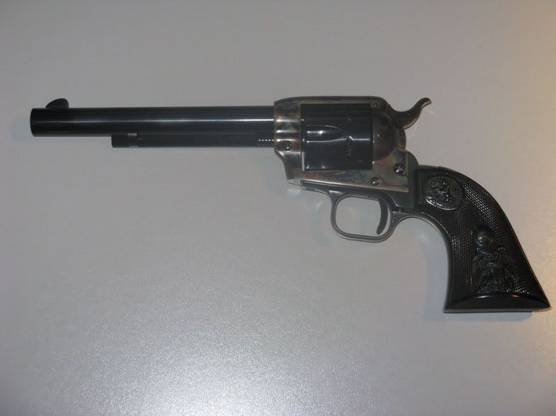small-Colt-Peacemaker-22.jpg Colt Peacemaker .22