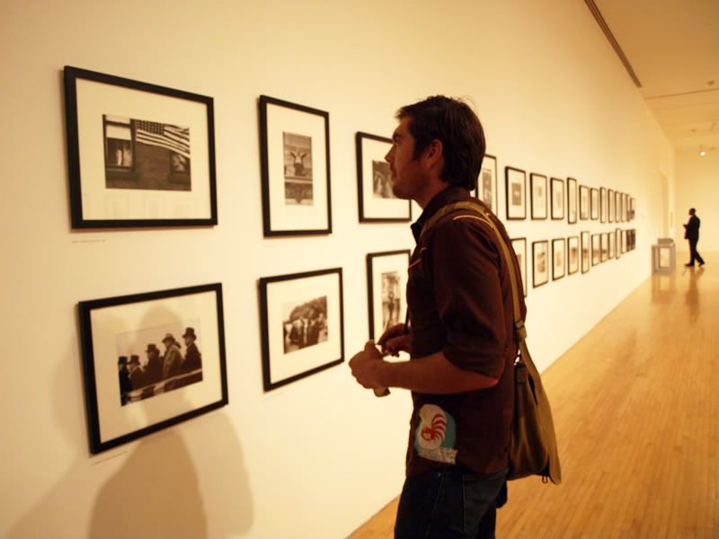 Ian looking at Robert Frank by Mia